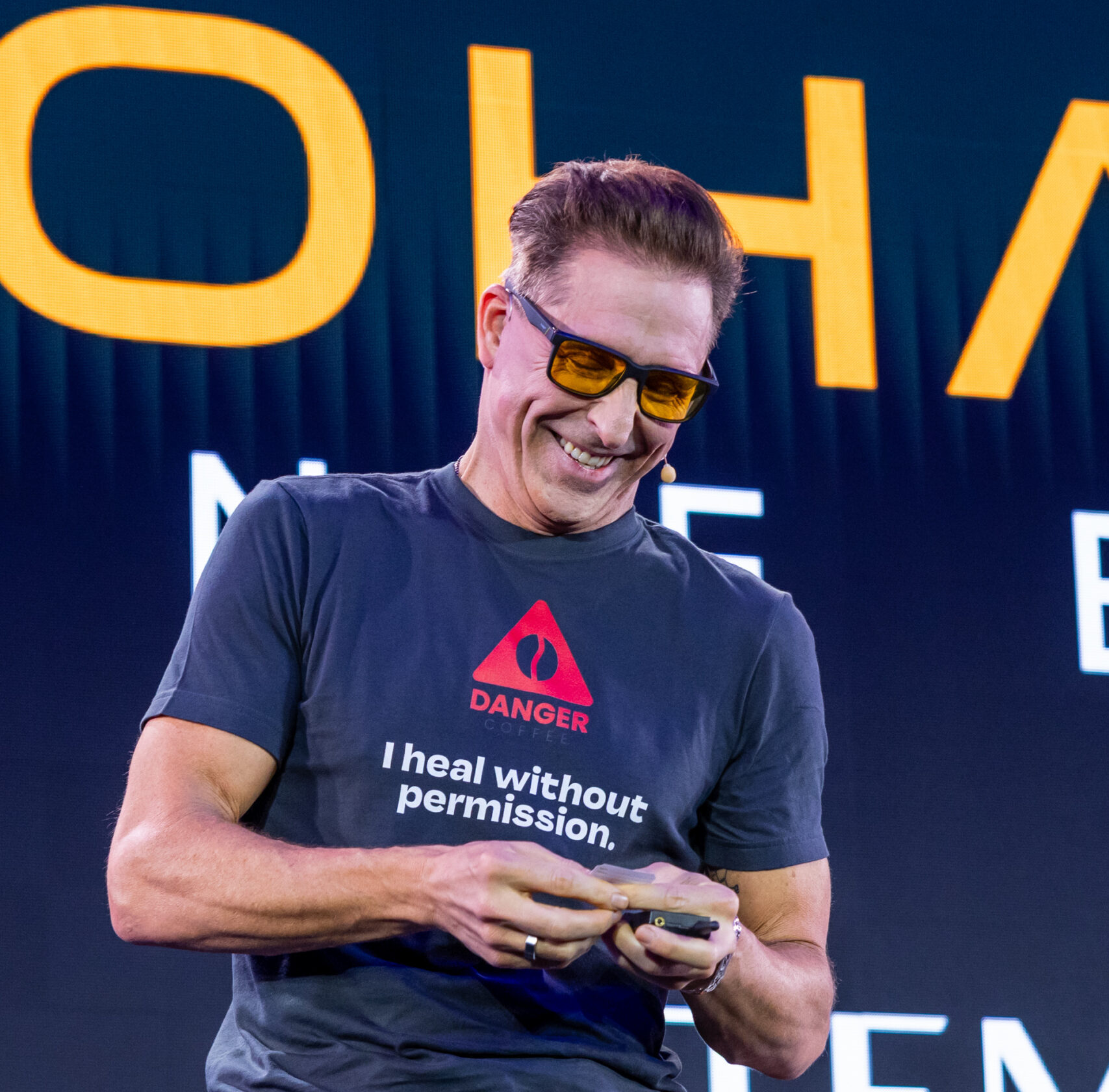 Dave Asprey smiling on stage