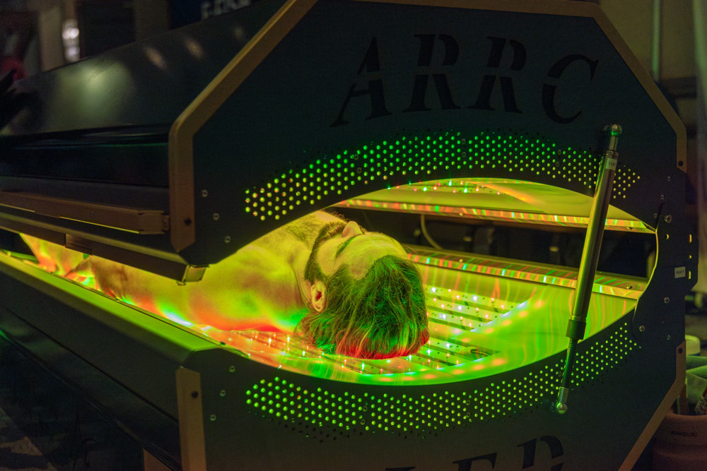 man in a technology bed